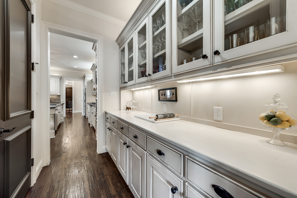    Butler s Pantry has Gorgeous Glass Front Cabinetry and Spacious Walk In Pantry 